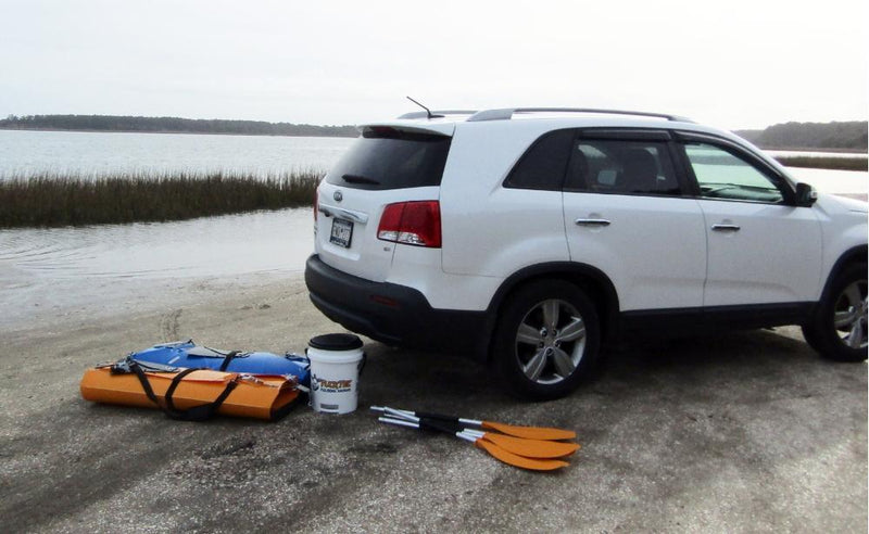 foldable kayaks in a car