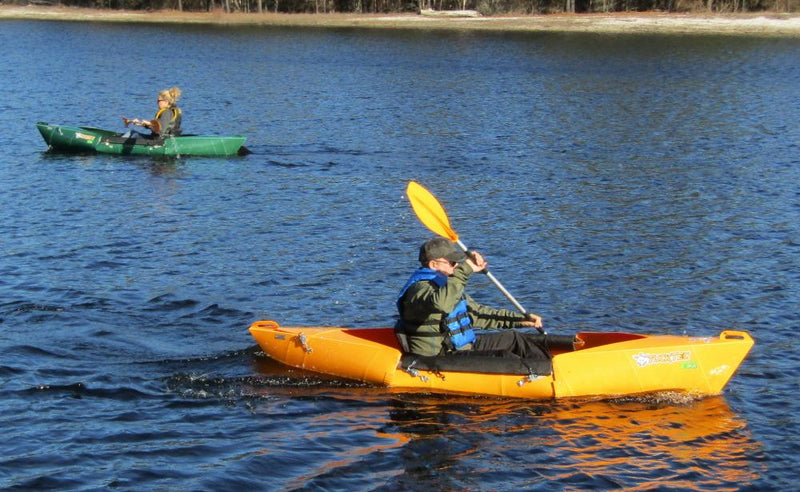 yellow and green foldable kayaks